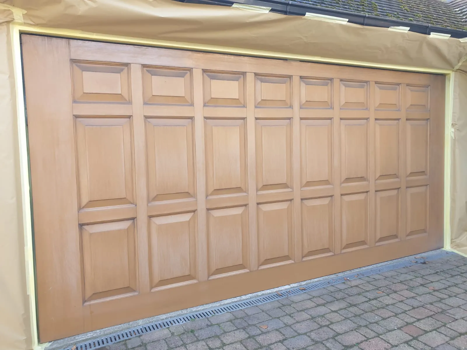 Maintaining Your Newly Resprayed Garage Door